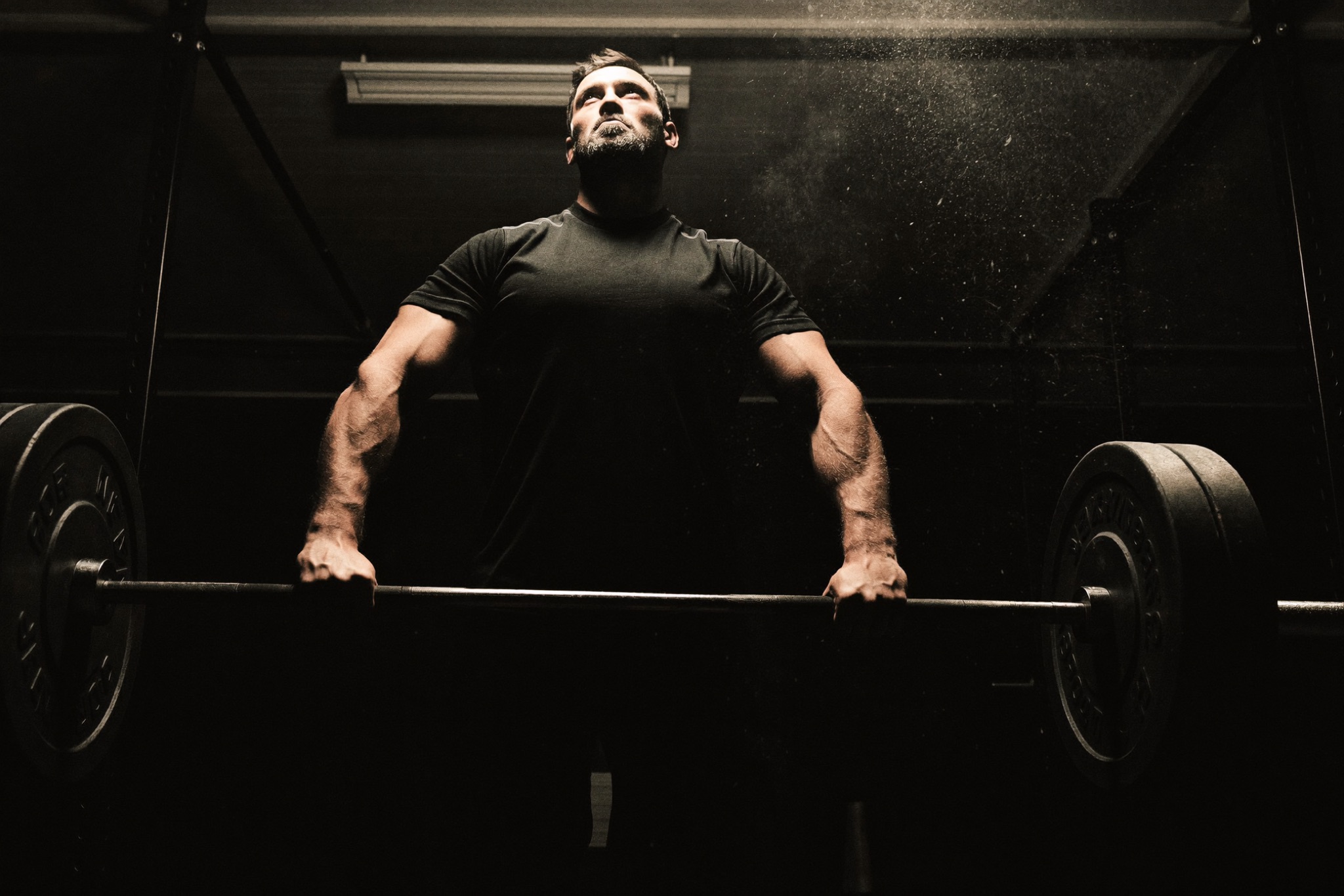 The coach under a loaded bar