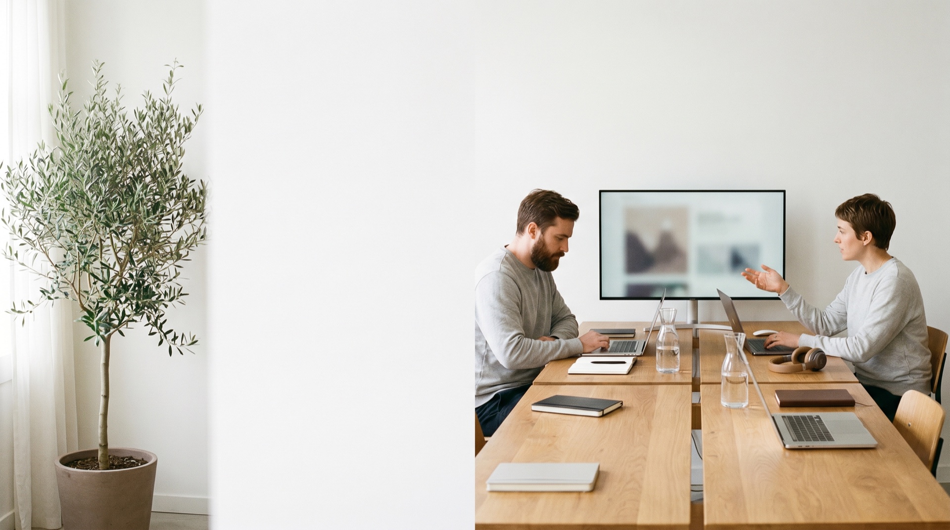 A sharp modern product team workspace with devices in soft daylight, considered and premium, generous negative space